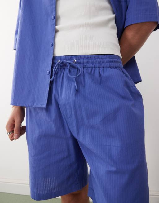 COLLUSION textured woven shorts in blue stripes