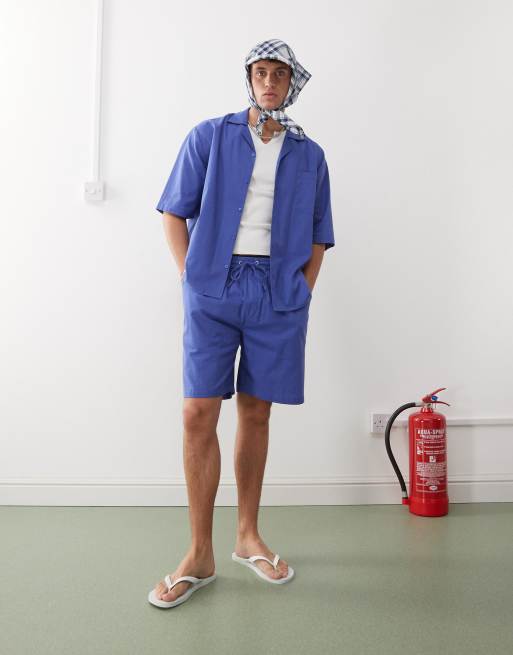 COLLUSION textured woven shorts in blue stripes