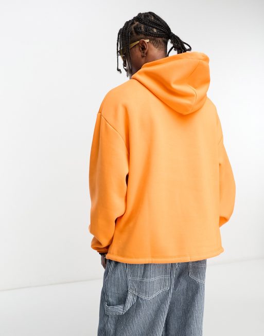 ASOS DESIGN oversized sweatshirt in neon orange