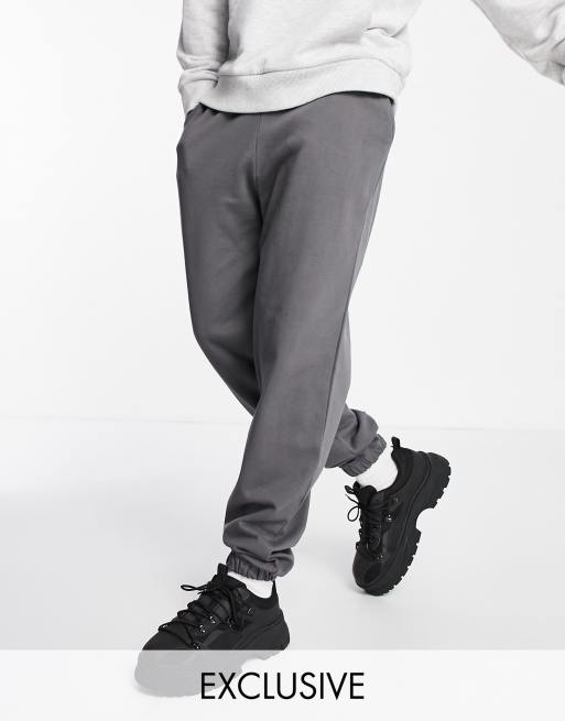 COLLUSION trackies in charcoal