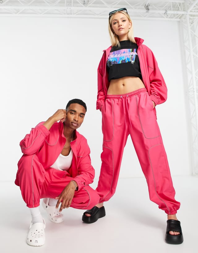 COLLUSION Unisex aughts fit sweatpants in bright pink - part of a set