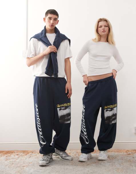 COLLUSION Unisex - Baggy joggingbroek met ruimvallende boorden in blauw met prints - view 1