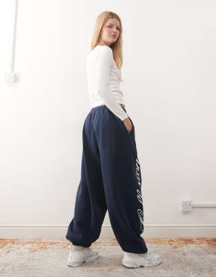 Collusion Unisex Baggy Relaxed Cuff Sweatpants In Blue