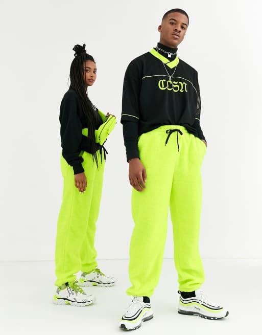 COLLUSION Unisex borg joggers in neon ASOS