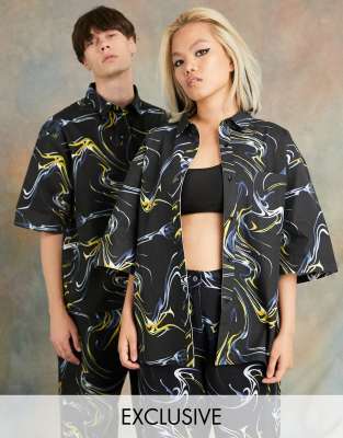 Shirt by COLLUSION Exclusive to ASOS All-over print Spread collar Button placket Chest pocket Drop shoulders Boxy fit Unisex style