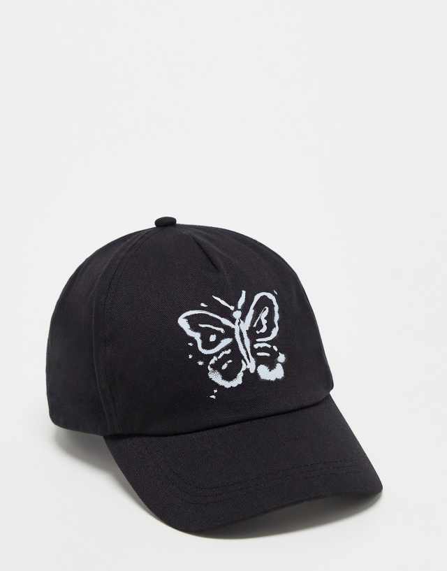 COLLUSION Unisex cap with bleach butterfly graphic in black