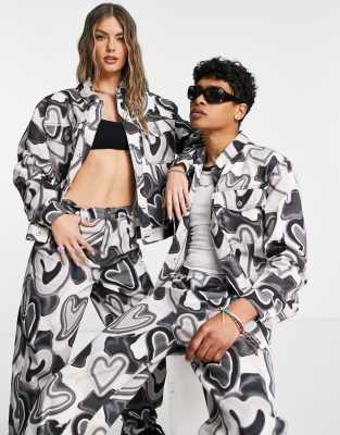 COLLUSION Unisex denim jacket in all over heart print co-ord