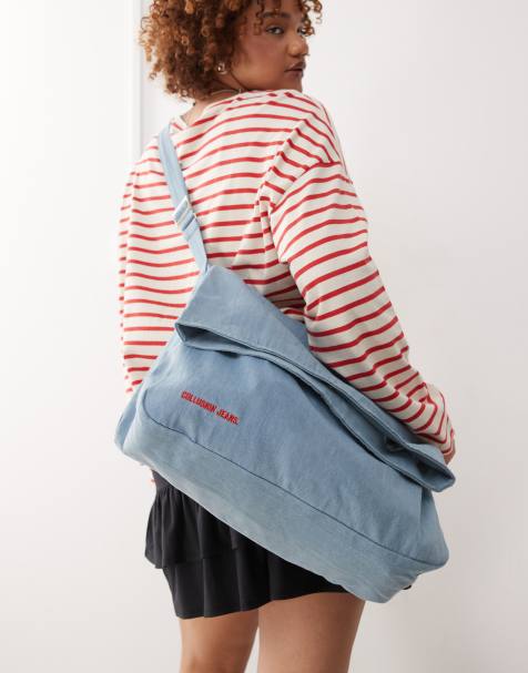COLLUSION Unisex denim sling bag in blue mid wash - view 1