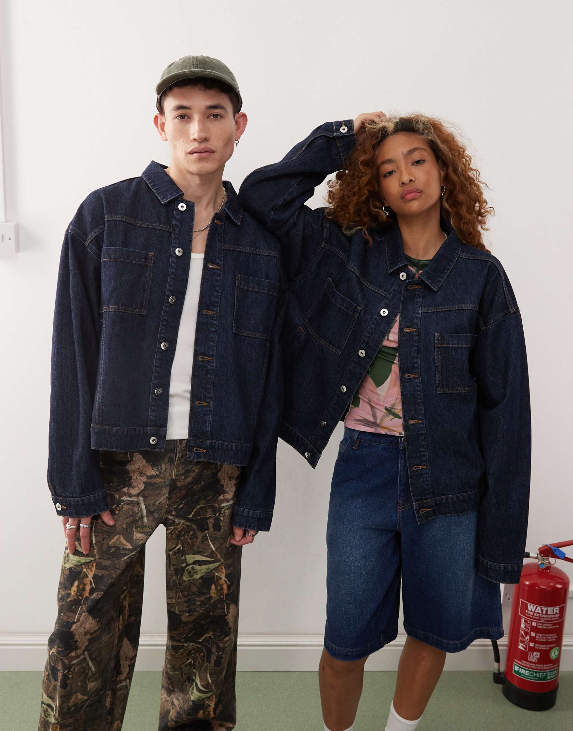 collusion unisex denim trucker jacket in rinsewash