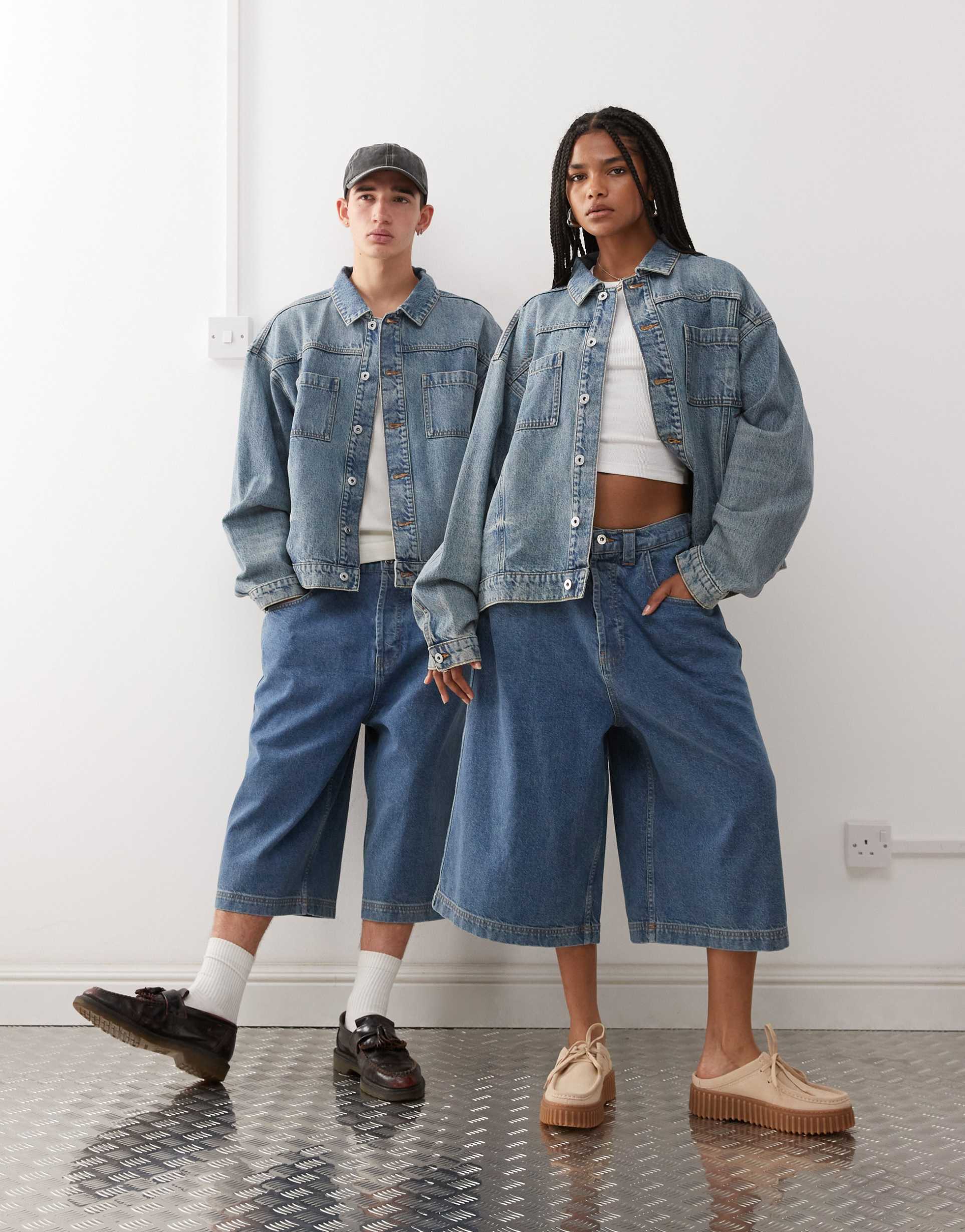 collusion unisex denim trucker jacket in stonewash