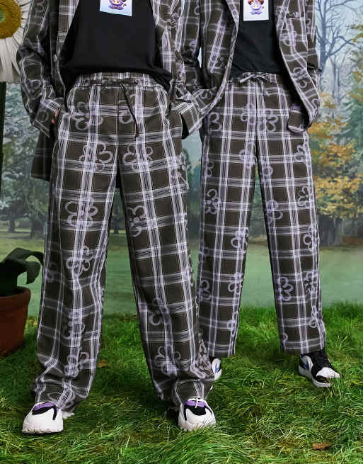 COLLUSION Unisex - Geruite broek met bloemenprint
