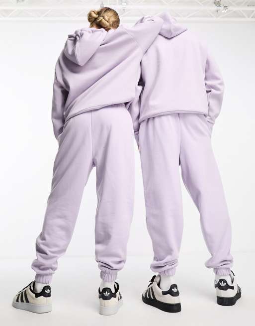 COLLUSION Unisex joggers with logo in lilac co-ord