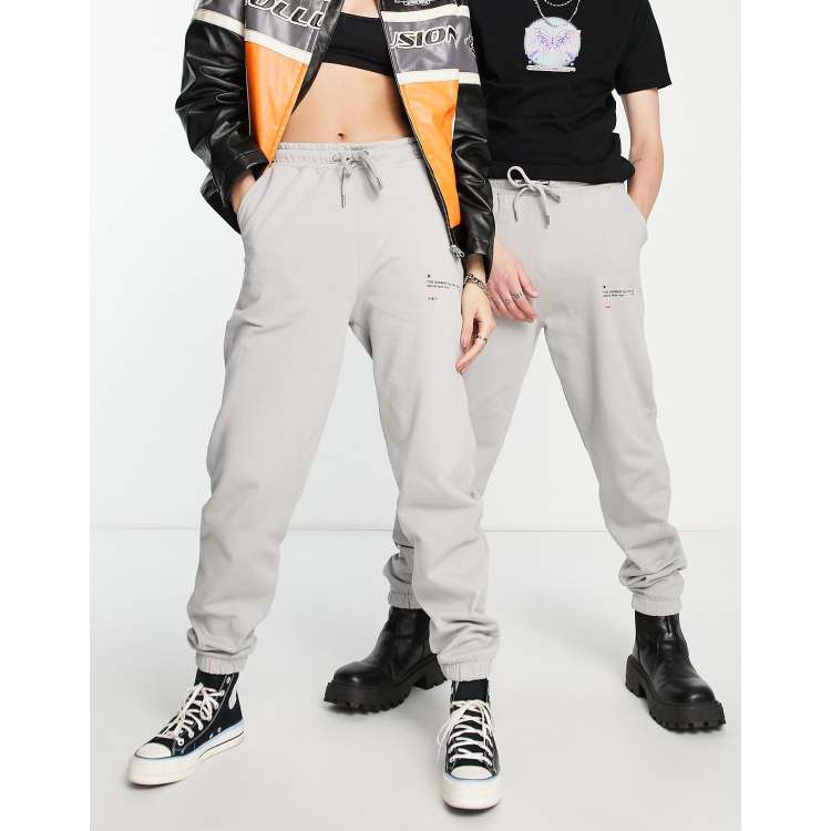 COLLUSION Unisex joggers with text print in grey Cra wallonieShops