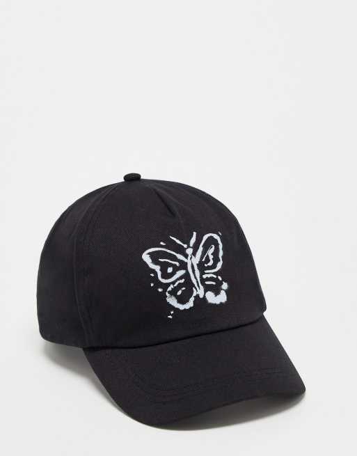 COLLUSION – Unisex – Kappe in Schwarz mit gebleichter Schmetterlings-Grafik
