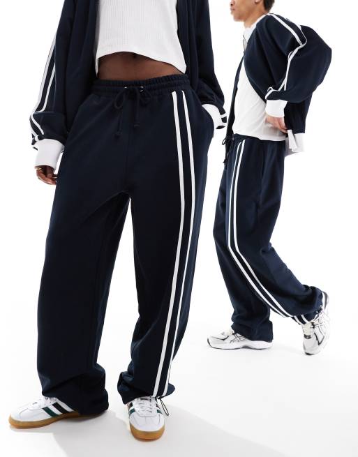 COLLUSION Unisex – Locker geschnittene Jogginghose in Marineblau und Braun, Kombiteil, 2 von 4