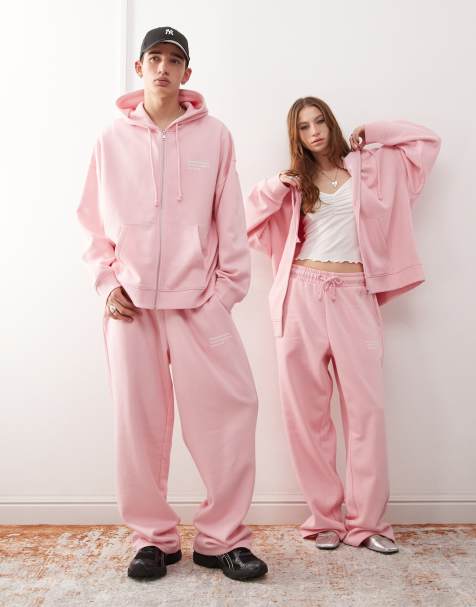 COLLUSION Unisex – Locker geschnittene Jogginghose in Rosa mit Koordinaten-Print, Kombiteil - view 1
