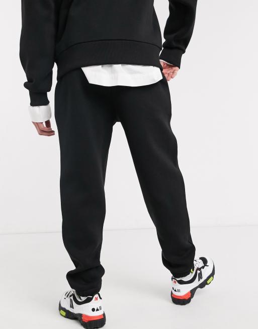 COLLUSION Unisex logo jogger in black