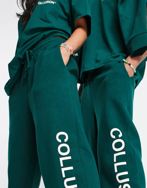 COLLUSION Unisex logo trackies in dark green | ASOS