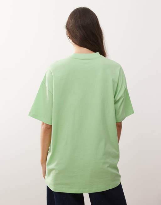 COLLUSION Unisex logo x t-shirt in green with burgundy print