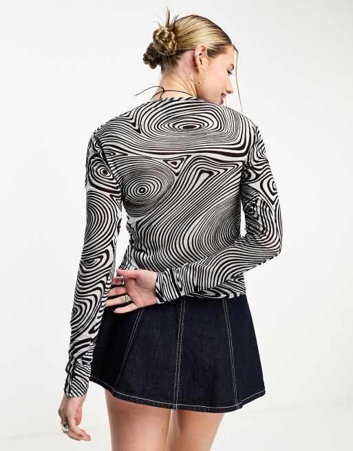 COLLUSION Unisex long sleeve swirl print top in blue