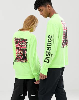 COLLUSION Unisex long sleeve t-shirt with graphic print in neon green