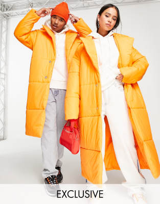 COLLUSION Unisex longline nylon puffer coat in orange