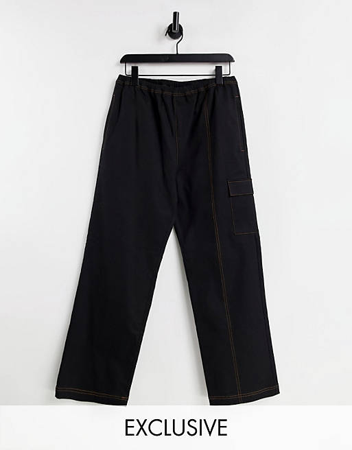 Women COLLUSION Unisex low rise contrast seam cargo trousers in black 