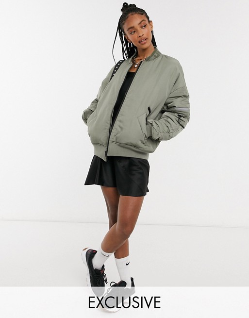 COLLUSION Unisex MA1 bomber jacket with ruched sleeve detail in khaki