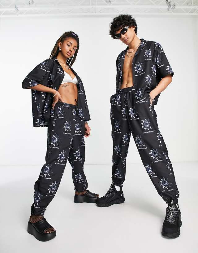 COLLUSION Unisex noughties fit sweatpants with all over print in black - part of a set