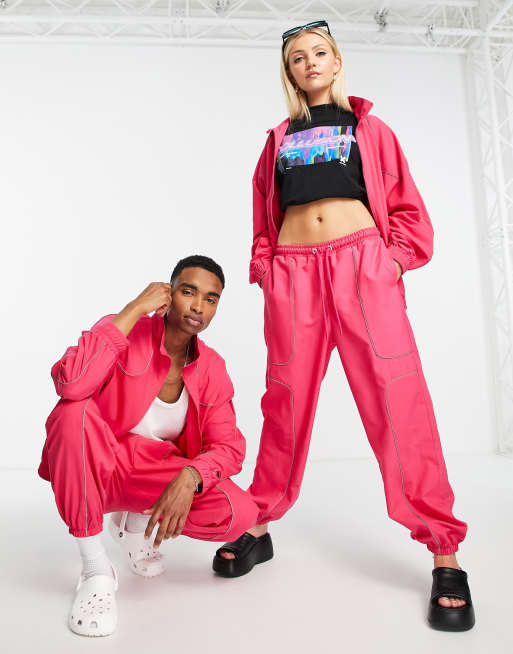 COLLUSION Unisex noughties fit trackies in bright pink (part of a set)