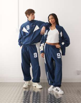 Collusion Unisex Nylon Paneled Tracksuit In Blue