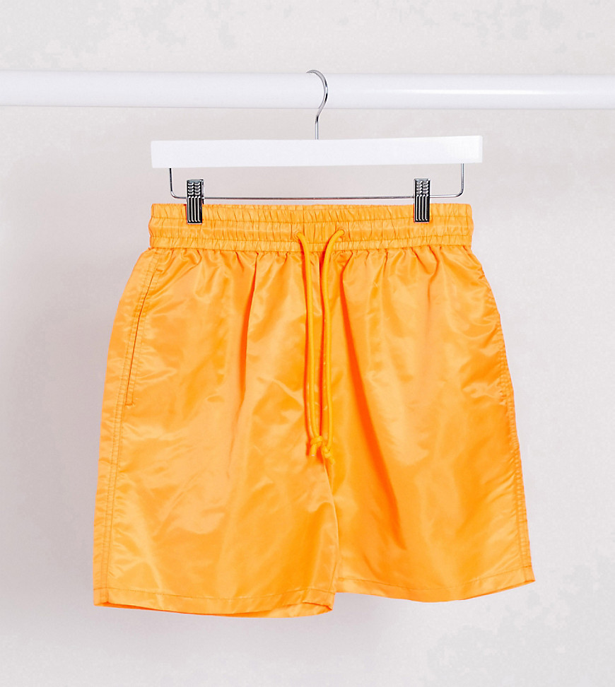 COLLUSION Unisex – Orange shorts i nylon