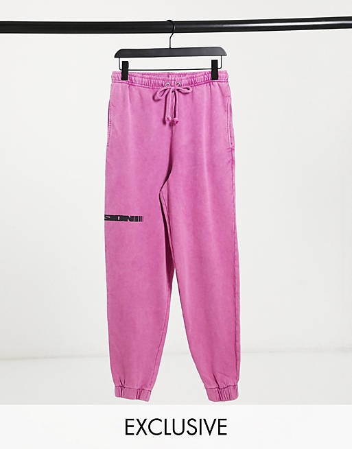 COLLUSION Unisex oversized joggers with print in pink acid wash | ASOS