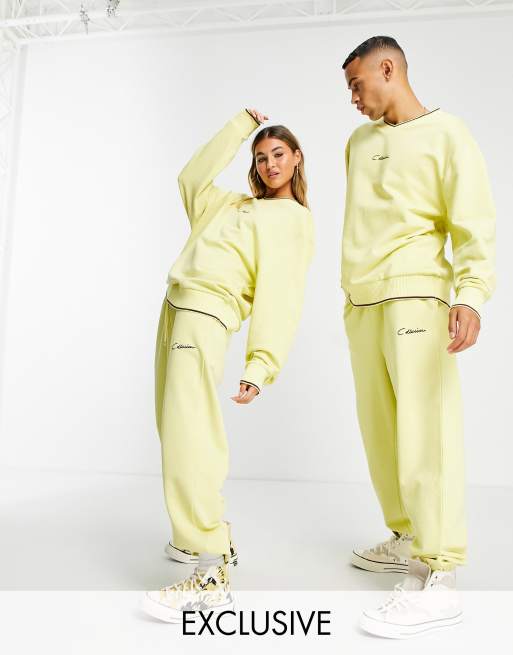 COLLUSION Unisex oversized varsity joggers in vintage yellow co-ord