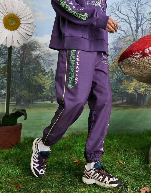 Collusion Unisex Oversized Woven Trackies With Character Print In