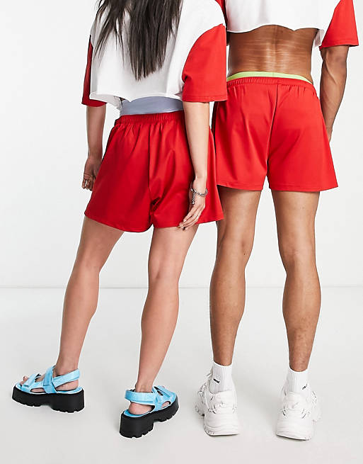 Unisex Pantaloncini rossi con stampa del logo in coordinato Asos Abbigliamento Pantaloni e jeans Shorts Pantaloncini 