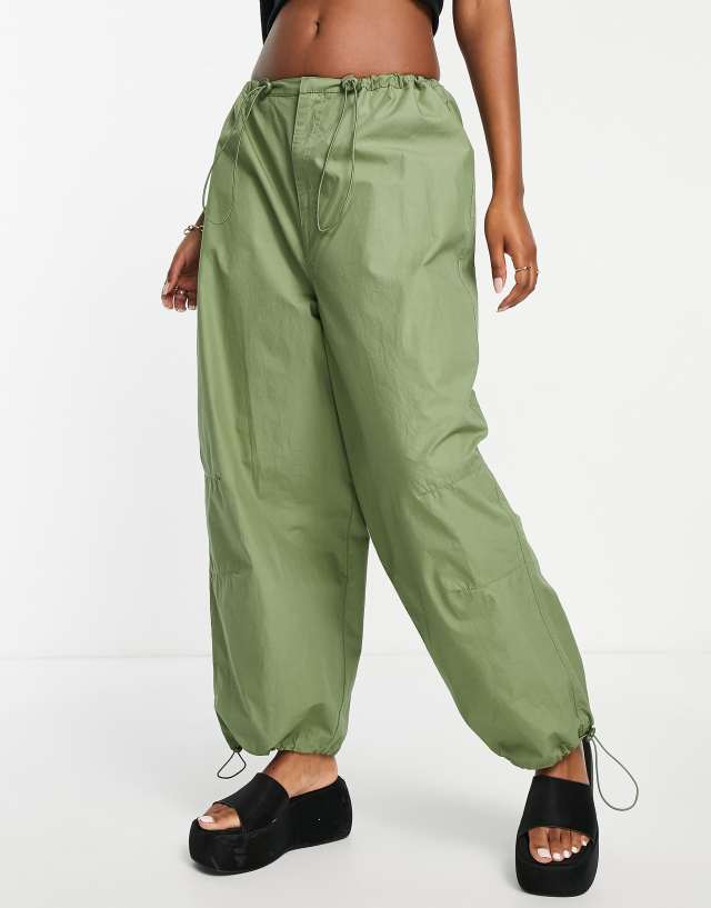 Collusion - unisex parachute trousers in green