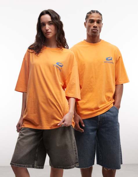 COLLUSION Unisex – Pomarańczowy T-shirt z długimi rękawami i niebieskim nadrukiem - view 1