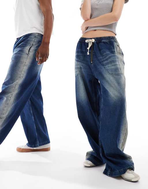 COLLUSION Unisex - Posede jogging-jeans i mørk vask