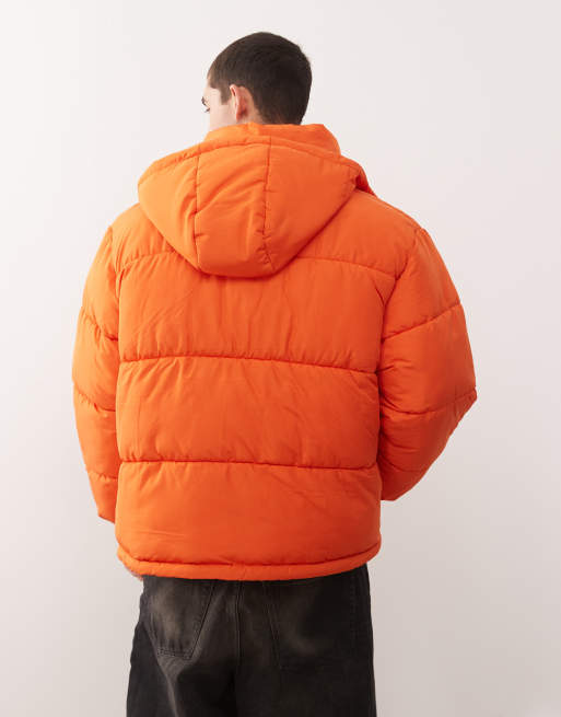 COLLUSION Unisex puffer jacket with hood in orange ASOS
