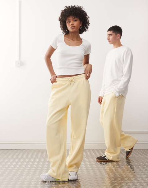 COLLUSION Unisex relaxed joggers in butter yellow - view 1