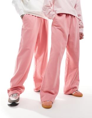  COLLUSION Unisex relaxed joggers in pink 