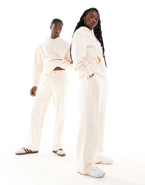 COLLUSION Unisex relaxed skate sweatpants in ecru - part of a set - view 1