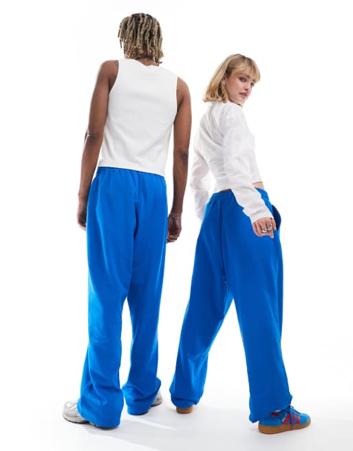 COLLUSION Unisex relaxed trackies in mid blue | ASOS