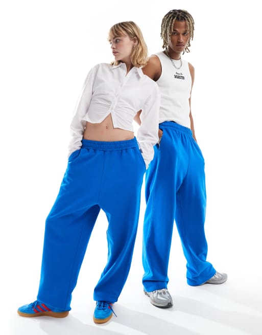 COLLUSION Unisex relaxed trackies in mid blue | ASOS