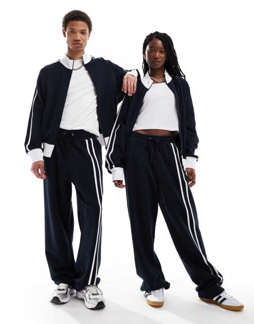 COLLUSION Unisex - Ruimvallende co-ord set met joggingbroek en jack in marineblauw en bruin, 3 van 3