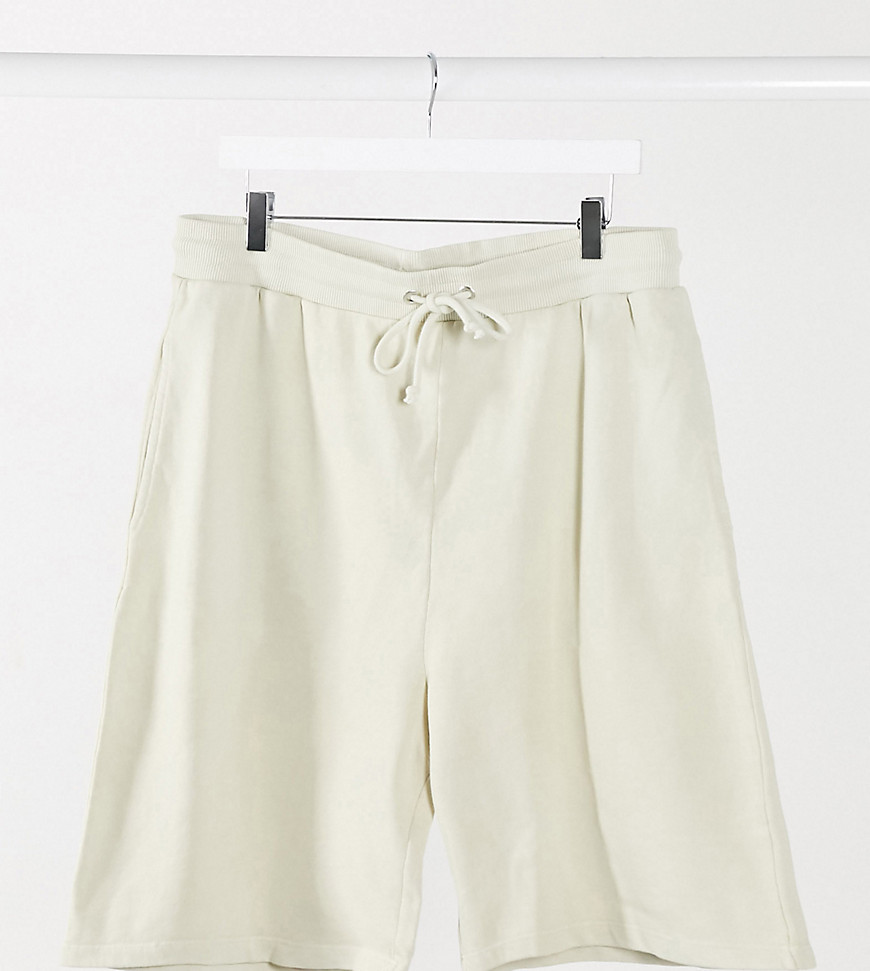COLLUSION Unisex shorts in washed ivory-White