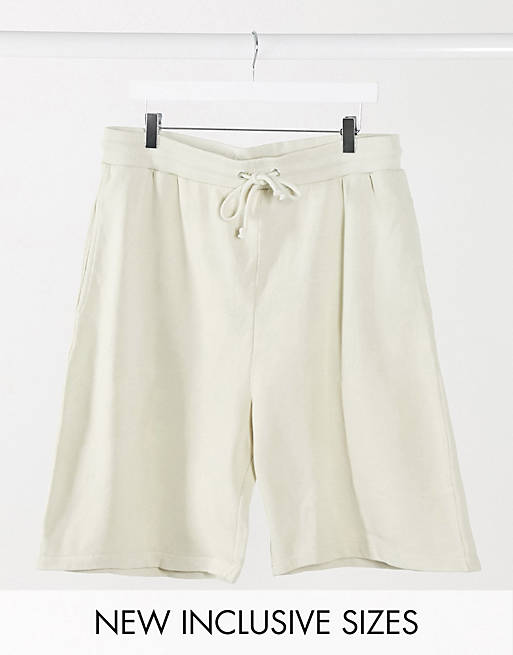 COLLUSION Unisex shorts in washed ivory