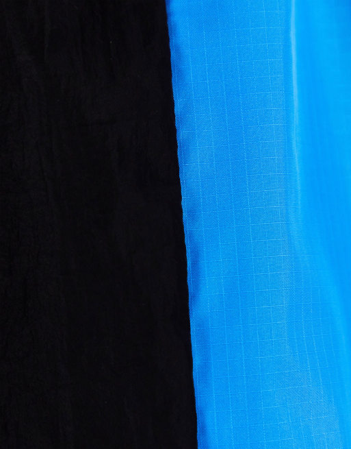 COLLUSION Unisex - Sportshort in zwart met blauw inzetstuk, 3 van 4