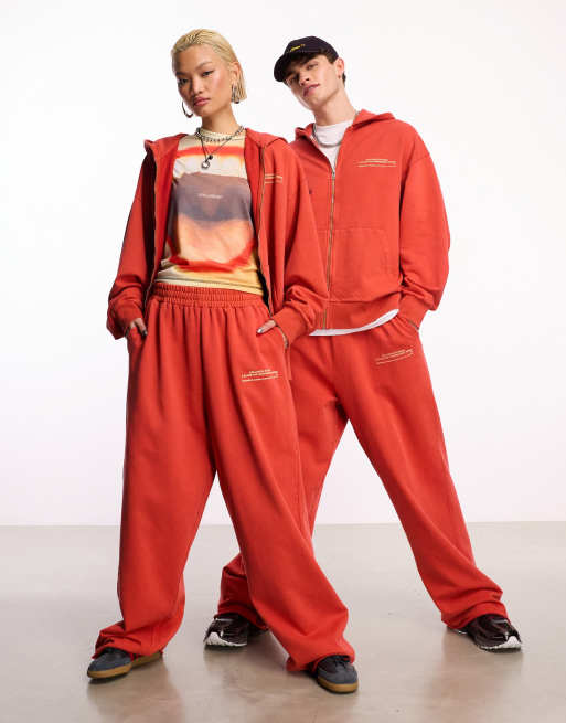 COLLUSION Unisex - STUDIOS - Joggingbroek in gebrand rood met wassing, deel van co-ord set